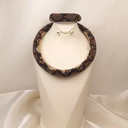 دستبند پوست مار منجوق بافی شده