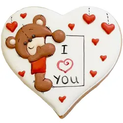 کوکی خرس برگه بدست روی قلب