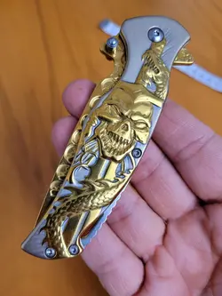 چاقو جیبی اسکلت طلایی تمام فلزی (اصل)