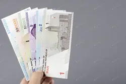 دانلود عکس با کیفیت اسکناس های ایرانی در دست