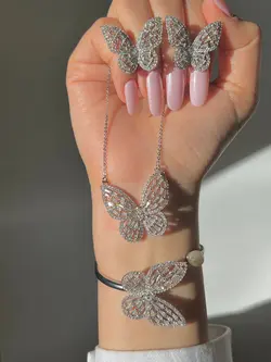 ست ژوپینگ سفید پروانه تمام مخراج (گردنبند/گوشواره/انگشتر/دستبند)