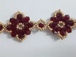 دستبند منجوق کریستالی زرشکی