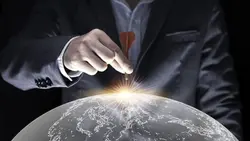 تصویر دست انسان با دارت و کره زمین با مفهوم تجارت - ایران پیک | پیکفری