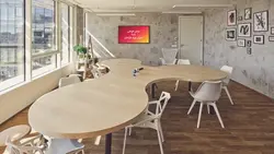 فایل لایه باز موکاپ تلویزیون روی دیوار در اتاق جلسه - ایران پیک | پیکفری