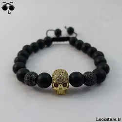 دستبند مشکی طلایی نگین دار اسکلتی