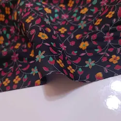 پارچه نخی/گلدار/نارنجی