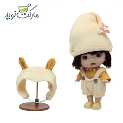 عروسک چشم تیله ای کلاه دار سفید