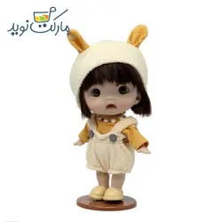 عروسک چشم تیله ای کلاه دار زرد