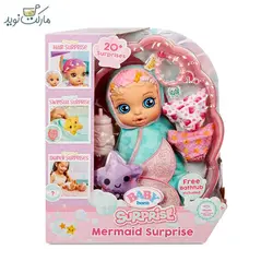 عروسک بیبی بورن سورپرایزی با حوله سبز