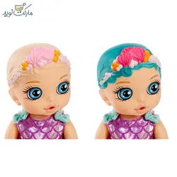 عروسک بیبی بورن سورپرایزی با حوله سبز
