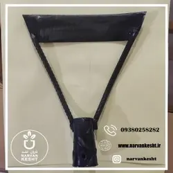 علف زن دستی با دسته چوبی