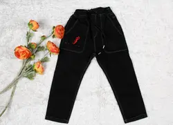 شلوار جین راسته بچه گانه کمرکش بنددار مشکی ذغالی گلدوزی