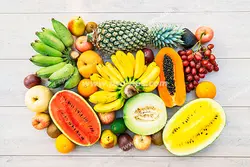 عکس با کیفیت تبلیغاتی میوه های استوایی در کنار یکدیگر