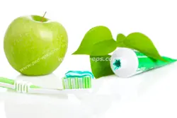 عکس با کیفیت تبلیغاتی خمیر دندان و مسواک و نعنا و سیب سبز