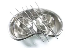 عکس با کیفیت تبلیغاتی پنس جراحی و ظرف استیل