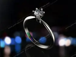 عکس با کیفیت تبلیغاتی انگشتر تک نگین طلا سفید با نگین جواهر