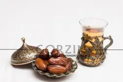 تصویر استکان چای و خرما با کیفیت
