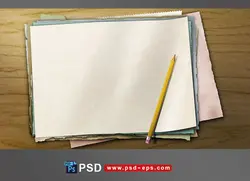 نقاشی طرح لایه باز برگه های با رنگ های مختلف بر روی هم به همراه مداد سیاه بر روی میز چوبی مناسب متن