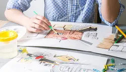 عکس با کیفیت میز کار مهندسی در حال طراحی داخلی منزل