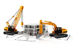 عکس با کیفیت ماشین های ساختمان سازی در حال کار با ماکت ساختمان و پلان های نقشه کشی