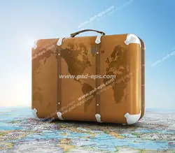 عکس با کیفیت چمدان قهوه ای قدیمی با نقشه قاره ها بر روی آن و بر روی نقشه