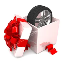 عکس با کیفیت تایر خودرو در جعبه هدیه سفید رنگ با روبان قرمز