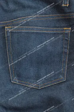 عکس با کیفیت نمای نزدیک از جیب شلوار لی آبی تیره با دوخت زرد رنگ ویژه استفاده در امور تبلیغاتی و تجاری طراحی کاتالوگ ، بروشور و تراکت با موضوع خیاطی ، تولیدی لباس ، آموزش خیاطی یا موسسات فنی و حرفه ای آموزش مقدماتی تا حرفه ای