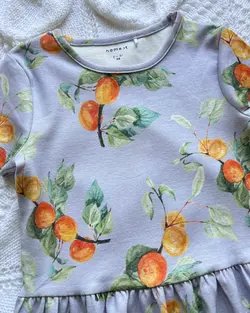 پيراهن نخي دخترانه برگ آناناس و آلو