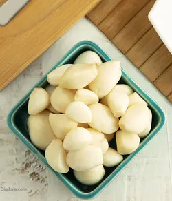 بیژن ترشی سیر ( مروارید صدفی ) شیشه ای 670 گرمی