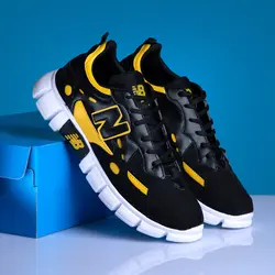 کفش کتانی مشکی زرد New Balance مردانه