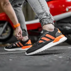 کفش کتانی پسرانه مشکی نارنجی 3 خط طرح  Adidas جدید