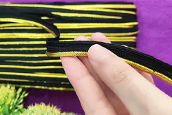 نوار مغزی  پایه مشکی لبه طلایی