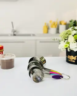 پیمانه 4تایی استیل دسته رنگی