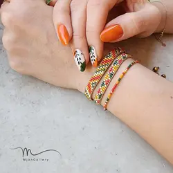 M0106 _ دستبند پاییزی خردلی،کرم و سبز( منجوق میوکی )