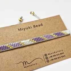 M0150 _ دستبند بنفش و صورتی  ( منجوق میوکی و ابریشمی )