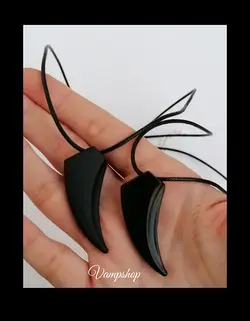 گردنبند دندان نیش کلاوس