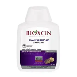 شامپو ضد ریزش مو بیوکسین Bioxcin مدل سیر سیاه مناسب موهای آسیب دیده حجم 300 میل