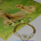 دستبند ماه تولد زنجیر کارتیر استیل و مروارید شل اکسسوری دستساز رنگ ثابت زنانه