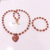 ست گردنبند و دستبند سنگ دلربا رنگ ثابت زنانه