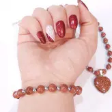 ست گردنبند و دستبند سنگ دلربا رنگ ثابت زنانه