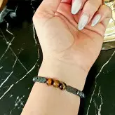 دستبند مردانه سنگ چشم ببر اونیکس مشکی حدید دودی رنگ ثابت اکسسوری دست ساز مردانه