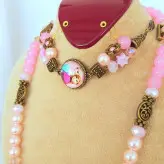 ست گردنبند و دستبند دخترانه آنا و السا صورتی اکسسوری دستساز دخترانه