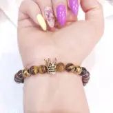 دستبند سنگ چشم ببر و گوی سوارسکی و حدید طلایی رنگ ثابت مردانه اکسسوری اسپرت پسرانه