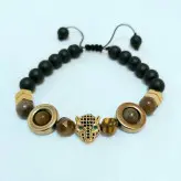 دستبند مردانه سنگ چشم ببر و حدید طلایی و سر ببر سوارسکی و اونیکس مشکی زیورآلات دستساز رنگ ثابت