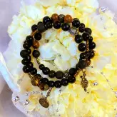 دستبند فنری سه دور سنگ چشم ببر و لاوا و اونیکس اکسسوری دستساز دخترانه