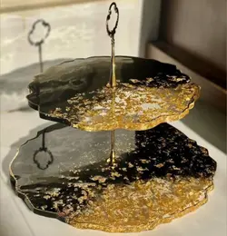 سرویس کامل ظروف رزینی طرح بابونه با ورق طلایی