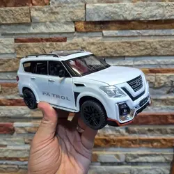 ماکت ماشین فلزی نیسان پاترول 2020 عقب کش 6 درب بازشو صداوچراغ دار برندچژی فله
