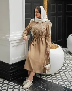 پیراهن مانتویی گلدوزی شده آستین دکمه دارد پشت لباس دکمه