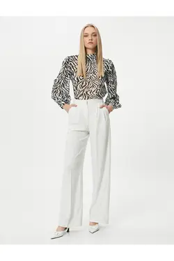 بلوز ابریشمی آستین بادکنکی یقه بلند طرح پلنگی - یاری شاپ