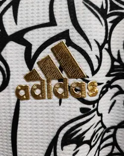 لباس دراگون رئال مادرید پلیری 2024 مشکی طلایی - پارسی اسپورت